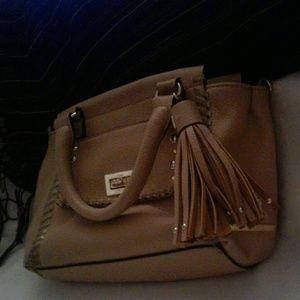 Tan colored purse.